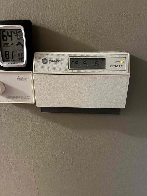 Conducted estimate visit for complete HVAC system replacement at residential property. Evaluated existing outdoor condensing unit and indoor climate control equipment, including current Trane XT302B thermostat and humidity monitoring system. Documented equipment specifications, assessed installation conditions, and provided comprehensive replacement options for new heating and cooling system.