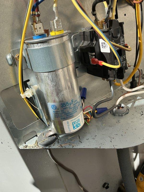 Completed scheduled cooling maintenance on residential HVAC system. Performed comprehensive inspection of evaporator coil, noting accumulated dust and debris on fins consistent with normal operation. Inspected electrical components including dual-run capacitor (35/5μF), control circuitry, and associated wiring connections, confirming all components operational and properly secured. Brought replacement air filter as requested for customer consideration. System tested and operating within normal parameters upon completion of maintenance procedures.
