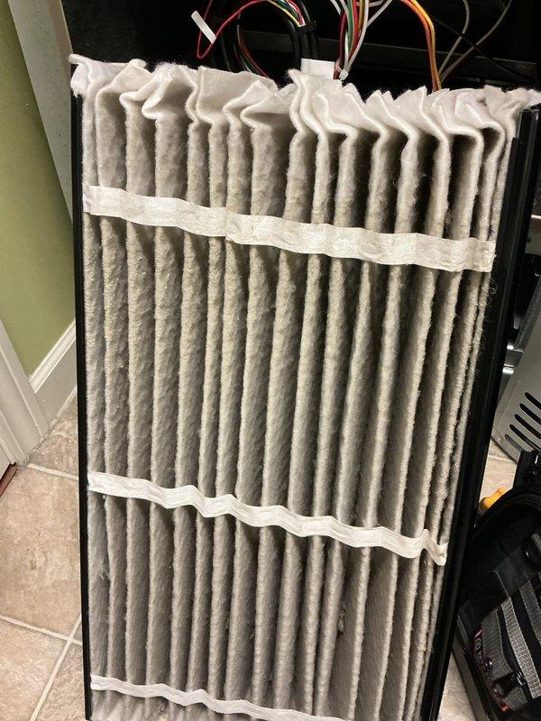 Completed scheduled cooling maintenance on residential HVAC system. Performed comprehensive inspection of evaporator coil, noting accumulated dust and debris on fins consistent with normal operation. Inspected electrical components including dual-run capacitor (35/5μF), control circuitry, and associated wiring connections, confirming all components operational and properly secured. Brought replacement air filter as requested for customer consideration. System tested and operating within normal parameters upon completion of maintenance procedures.