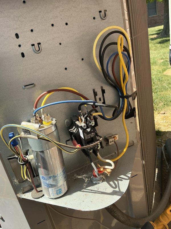 Completed scheduled air conditioning tune-up maintenance service. Inspected and photographed 16x25x1 air filter showing moderate dust accumulation and debris, indicating normal usage since last service. Examined outdoor condensing unit electrical components including capacitor, contactor, and associated wiring connections; all components found secure with proper wire management and in functional operating condition.