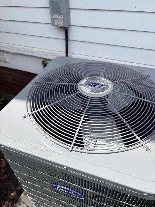 Completed comprehensive preventative maintenance tune-up on dual-system residential HVAC installation. Performed full system inspection and service on both Carrier condensing units, including cleaning condenser coils, checking refrigerant levels, testing electrical connections and capacitors, verifying proper amperage draw, inspecting fan motor operation, and ensuring adequate airflow through both systems. Verified proper operation of disconnect boxes and electrical conduits, confirmed units are level on concrete pads, and noted filters available on-site for replacement. Both systems operating within manufacturer specifications with no deficiencies noted. Customer enrolled in ongoing maintenance plan for continued system performance and longevity.
