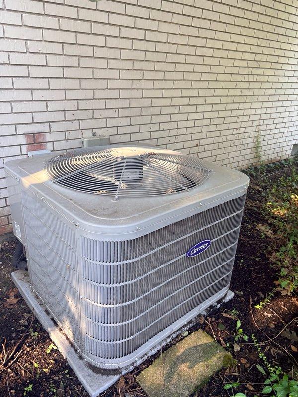 Completed scheduled cooling maintenance on residential Carrier air conditioning system. Performed comprehensive inspection of outdoor condenser unit, verified capacitor connections and electrical components, checked refrigerant lines and fittings for proper operation. All components found to be functioning within normal parameters with unit showing typical weathering for age; system operational and ready for cooling season.