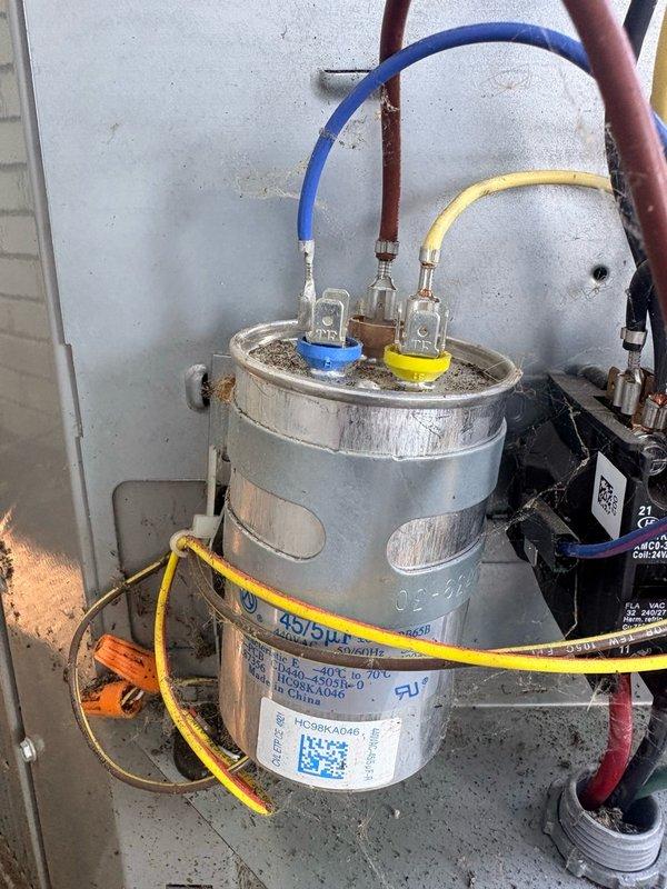 Completed scheduled cooling maintenance on residential Carrier air conditioning system. Performed comprehensive inspection of outdoor condenser unit, verified capacitor connections and electrical components, checked refrigerant lines and fittings for proper operation. All components found to be functioning within normal parameters with unit showing typical weathering for age; system operational and ready for cooling season.