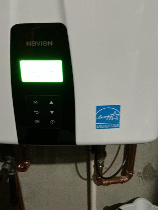 Performed scheduled maintenance flush on Navien tankless water heater unit that was previously installed in March 2025. Completed descaling procedure by circulating cleaning solution through the heat exchanger to remove mineral buildup and sediment accumulation, ensuring optimal performance and efficiency of the system. Verified proper operation of all components, confirmed digital display functionality, and inspected inlet/outlet connections and shut-off valves upon completion.