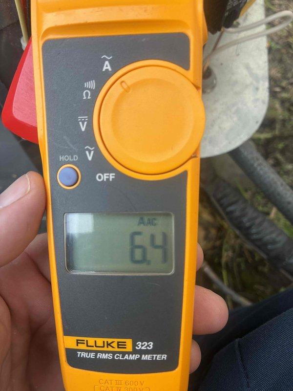 # HVAC Cooling System Maintenance Completed

Performed scheduled cooling system maintenance on residential air conditioning unit. Conducted comprehensive electrical diagnostics using calibrated testing equipment. Measured compressor amperage draw at 64 amps AC using clamp meter, confirming operational parameters within manufacturer specifications. Verified incoming line voltage at 358 volts AC at the condensing unit, indicating proper electrical supply to the system. All electrical measurements recorded normal values with no anomalies detected. System operating efficiently with no immediate service needs identified. Unit cleared for continued operation through cooling season.