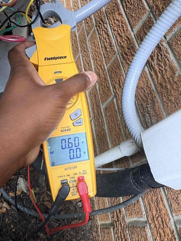 Completed scheduled cooling maintenance visit on residential HVAC system. Performed comprehensive inspection of evaporator coil assembly, confirming proper fin condition and structural integrity with minimal dust accumulation noted. Conducted electrical testing at outdoor condensing unit using digital multimeter, verifying system amperage and electrical performance within manufacturer specifications.