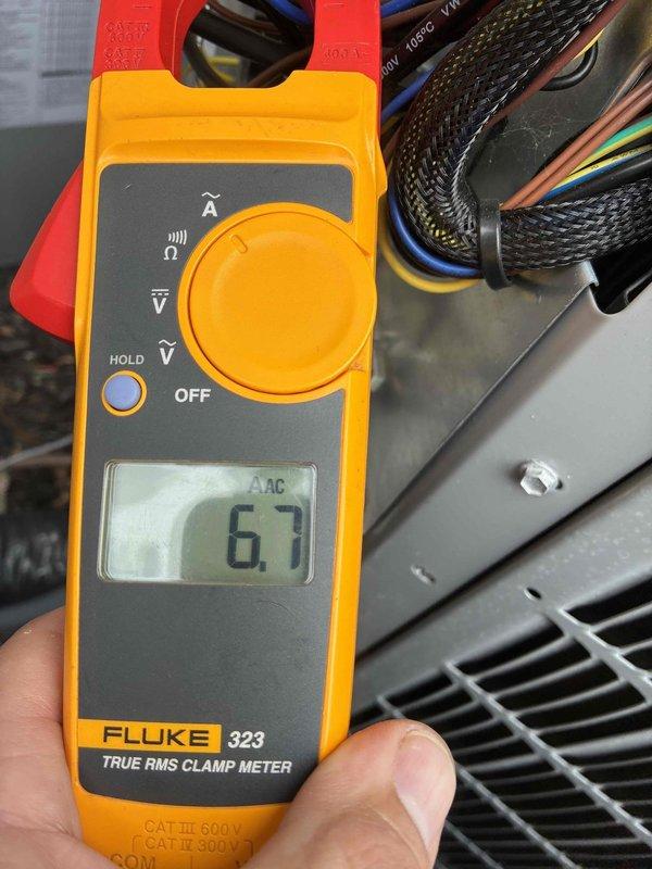 Completed scheduled cooling maintenance visit on residential HVAC system. Performed comprehensive system inspection and measured electrical current draw using clamp meter, recording 67 amps AC on compressor circuit to verify proper operating amperage within manufacturer specifications. All components found operating normally with no deficiencies noted.
