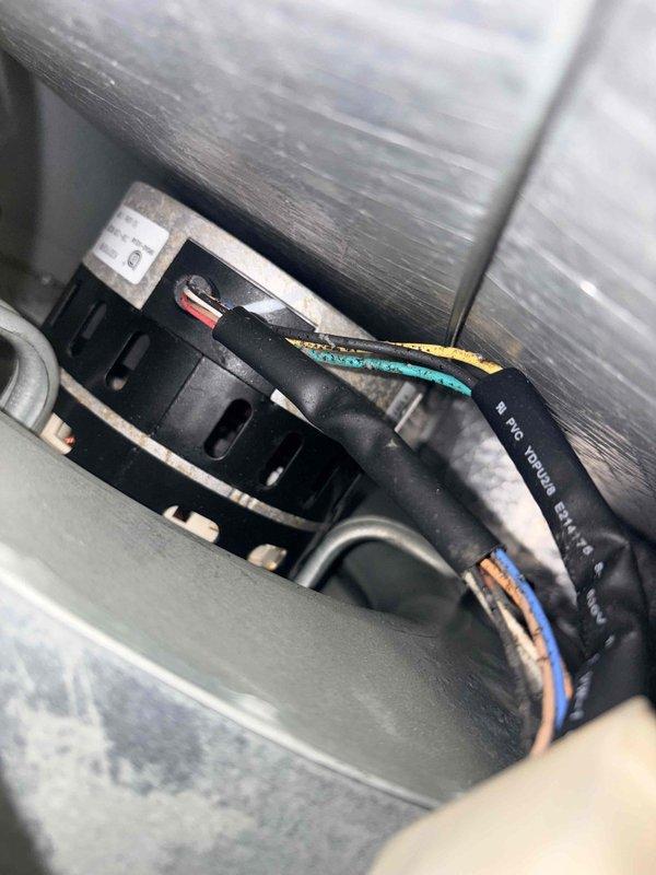 Completed scheduled preventative maintenance on residential cooling system and air handler unit. Performed comprehensive inspection of internal components, electrical connections, and terminal blocks. Documented equipment condition with photos showing wiring configurations, power connections, and internal compartment status for service records.