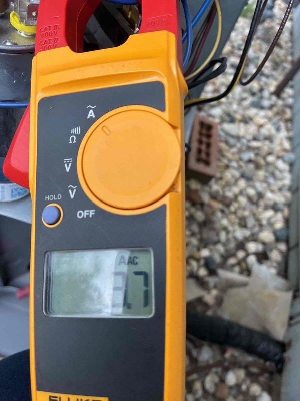 Completed final cooling maintenance visit under current maintenance agreement. Performed comprehensive system inspection and testing of outdoor condensing unit, including amperage draw measurements on compressor and condenser fan motor using clamp meter. All electrical components tested within normal operating parameters, with compressor drawing 0.5 amps and system voltage reading 77 VAC during diagnostic testing. Visual inspection of wiring connections, contactors, and capacitors showed no signs of wear or degradation. System operating efficiently with no deficiencies noted. Customer confirmed intent to renew maintenance plan for continued service coverage.