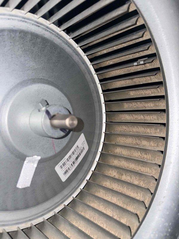 Completed monthly cooling maintenance on two HVAC systems. Inspected blower wheel assembly and noted moderate dust and debris accumulation on centrifugal fan blades and interior components; documented condition with photos showing buildup on blower housing and filter areas. All mechanical components, electrical connections, and wiring verified intact and operational; systems functioning within normal parameters.