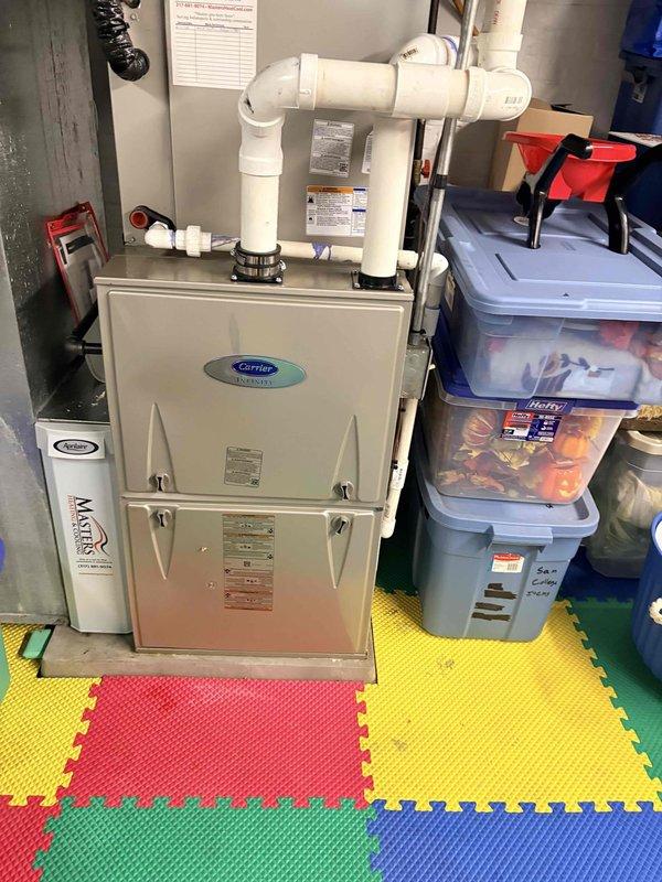 Completed scheduled cooling maintenance on two HVAC systems. Performed comprehensive inspection of Carrier furnace unit with integrated cooling system, verified proper operation of all components, and checked refrigerant levels. Replaced AprilAire Stock No. 210 pleated air filter to ensure optimal airflow and system efficiency. Inspected condensate drainage system including PVC piping, confirmed proper airflow direction, and tested thermostat operation. Both systems operating within manufacturer specifications with no deficiencies noted at time of service.