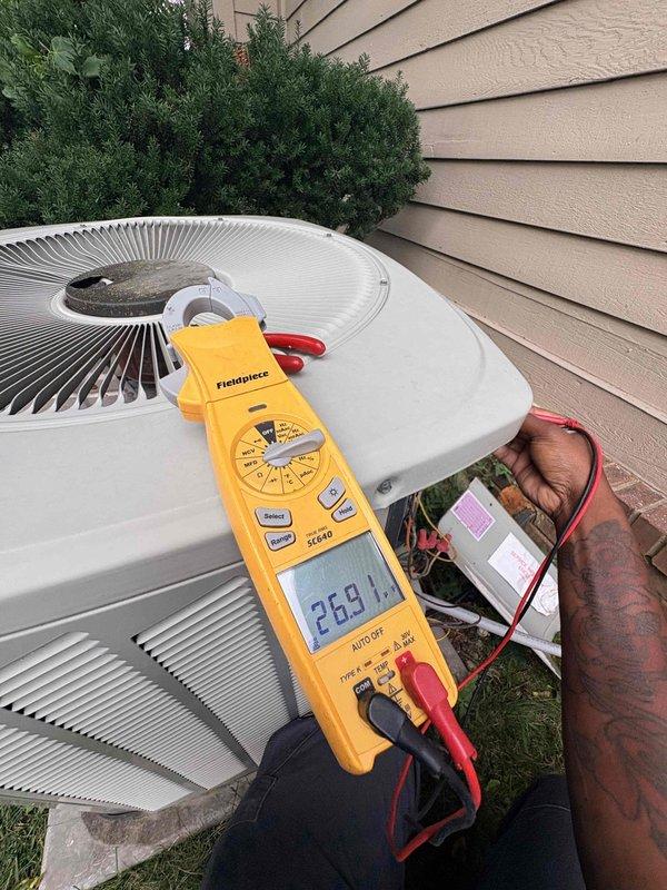 Completed scheduled cooling maintenance on two residential air conditioning systems. Performed comprehensive inspection of outdoor condenser units, including visual assessment of fan assembly, housing condition, and electrical components. Tested and recorded capacitor voltage readings at 25.91 using digital multimeter to verify proper electrical operation and system performance.