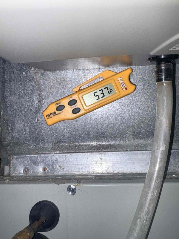 Completed scheduled cooling maintenance on residential HVAC system. Inspected furnace unit and associated components including refrigerant lines, condensate drainage, and ductwork. Observed heavy frost accumulation on evaporator coil with suction line temperature reading of 53.7°F, indicating potential airflow restriction or refrigerant charge issue that will require further evaluation and correction to restore proper system operation.