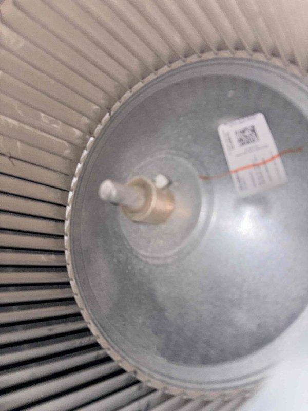 Completed scheduled cooling maintenance on residential HVAC system. Inspected blower wheel assembly and documented dust accumulation on fan blades and housing, which is within normal operating parameters. Examined air filter element showing clean pleated media with minimal debris, confirming adequate airflow and proper filtration performance for continued system operation.