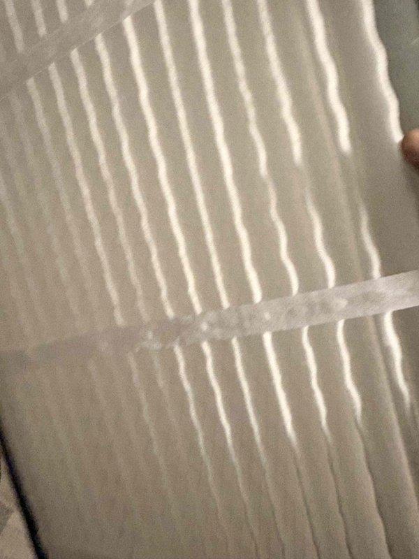 Completed scheduled cooling maintenance on residential HVAC system. Inspected blower wheel assembly and documented dust accumulation on fan blades and housing, which is within normal operating parameters. Examined air filter element showing clean pleated media with minimal debris, confirming adequate airflow and proper filtration performance for continued system operation.