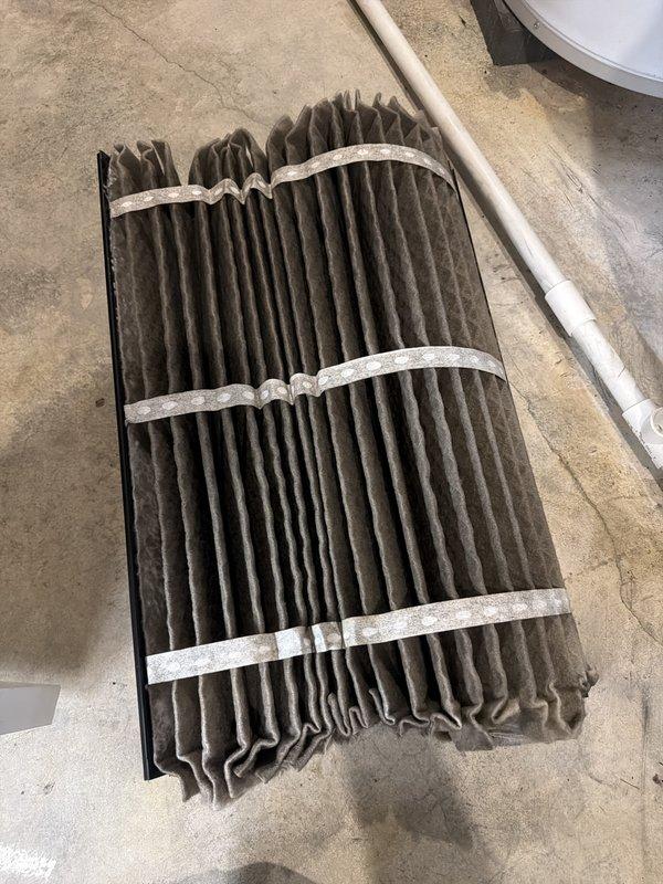 Completed annual cooling maintenance on residential HVAC system. Removed and cleaned heavily soiled evaporator coils that showed significant accumulation of dust and debris throughout the pleated fins. Inspected all system components including ductwork connections, condensate drainage lines, electrical connections, and mounted equipment in attic space. Reinstalled cleaned coils and verified proper system operation to ensure optimal cooling efficiency for the upcoming season.