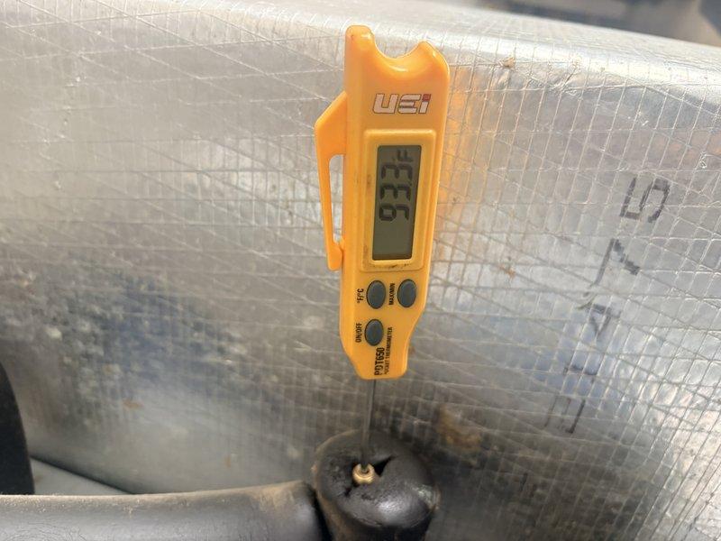 Completed scheduled cooling maintenance on geothermal heat pump system. Inspected and documented system temperatures at supply ductwork, recording 39.5°F at insulated supply plenum. Evaluated air filter condition, noting moderate dust accumulation on pleated media, and confirmed adequate airflow through system.