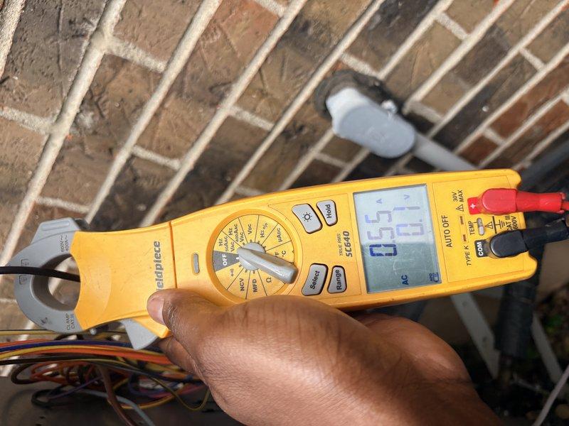 Completed scheduled cooling maintenance on residential HVAC system. Performed electrical testing using clamp meter to verify proper amperage draw and system performance. Inspected capacitor, wiring connections, and control components, confirming all electrical connections were secure and system was operating within manufacturer specifications.