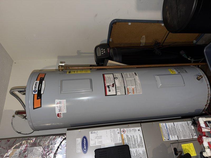 Completed scheduled cooling maintenance on Carrier air handler system located in utility room. Performed comprehensive inspection of unit, documented equipment condition with photos, and checked air filter size per customer request—filter was assessed and found to be in acceptable condition at this time. All system components operating within normal parameters.