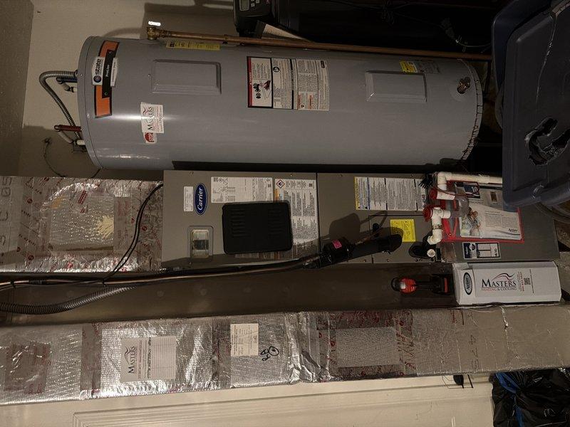 Completed scheduled cooling maintenance on Carrier air handler system located in utility room. Performed comprehensive inspection of unit, documented equipment condition with photos, and checked air filter size per customer request—filter was assessed and found to be in acceptable condition at this time. All system components operating within normal parameters.