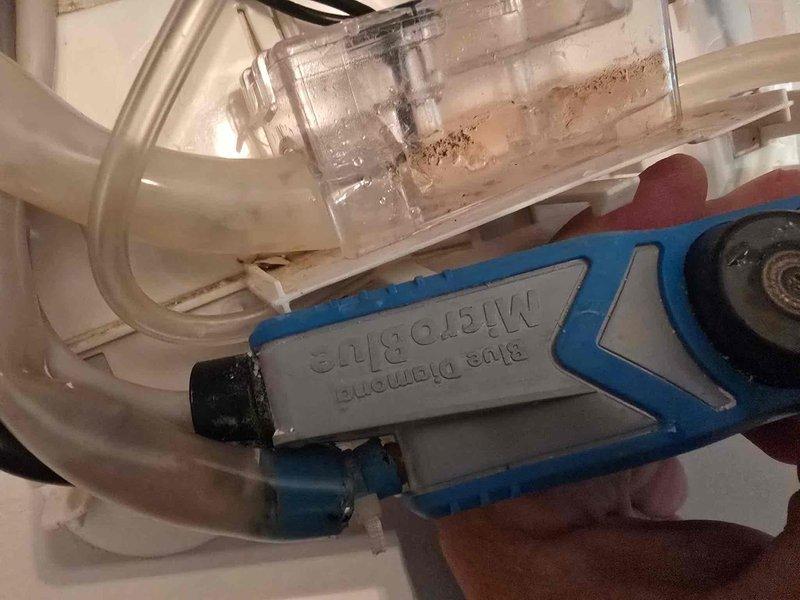 Responded to no-cool complaint on upstairs mini-split system with water leak causing damage to carpet. Upon inspection, found condensate pump failure with clogged reservoir and malfunctioning float switch preventing proper drainage. Removed pump assembly, cleaned debris from reservoir chamber, verified overflow safety switch operation, and tested all drain lines for proper flow. System restored to normal operation with condensate draining correctly and cooling function verified.
