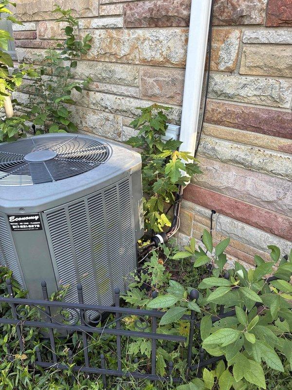 Conducted on-site evaluation for complete HVAC system replacement and relocation. Assessed existing outdoor condensing unit positioned against exterior stone wall with surrounding vegetation and documented current floor register installation with insulation. Provided comprehensive replacement quote including equipment specifications and relocation options to optimize system performance and placement.
