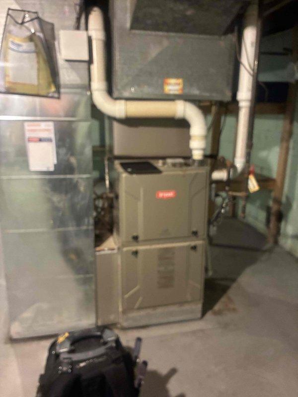 Responded to flood-damaged furnace inspection request following basement water damage exceeding three feet. Conducted thorough assessment of Bryant furnace unit, air handler, and associated HVAC components including PVC venting, ductwork connections, and electrical systems. Documented equipment condition with photographs showing water line impact on mechanical systems and provided customer with comprehensive evaluation for repair versus replacement options.