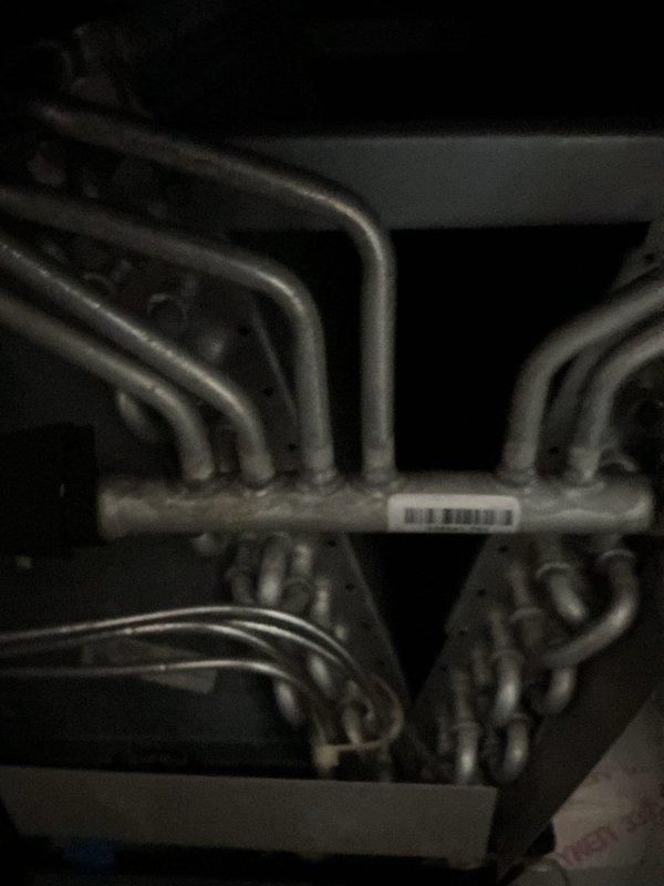 Completed preventative maintenance tune-up on residential HVAC system as part of promotional service award. Performed standard inspection of evaporator coil assembly, documented coil condition and heat exchanger components with photographs, and verified proper operation of all accessible system components during scheduled appointment window.