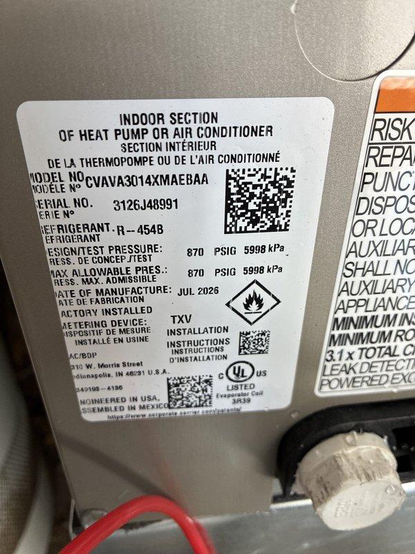 Completed full HVAC system installation including Carrier 26SCA424N003 single-stage air conditioner with R-454B refrigerant, CVAVA2414XMA evaporator coil, 58SB0B070M14--12 single-stage gas furnace with 70,000 BTU capacity, and TSTATCCEWF-01 Wi-Fi smart thermostat. Outdoor condenser unit positioned on concrete pad with proper clearances, indoor coil installed in air handler plenum, furnace mounted and vented per code requirements, and thermostat configured with Wi-Fi connectivity and system parameters. All equipment tested for proper operation, refrigerant charge verified, gas connections leak-checked, condensate drainage confirmed, and system cycling through heating and cooling modes successfully.