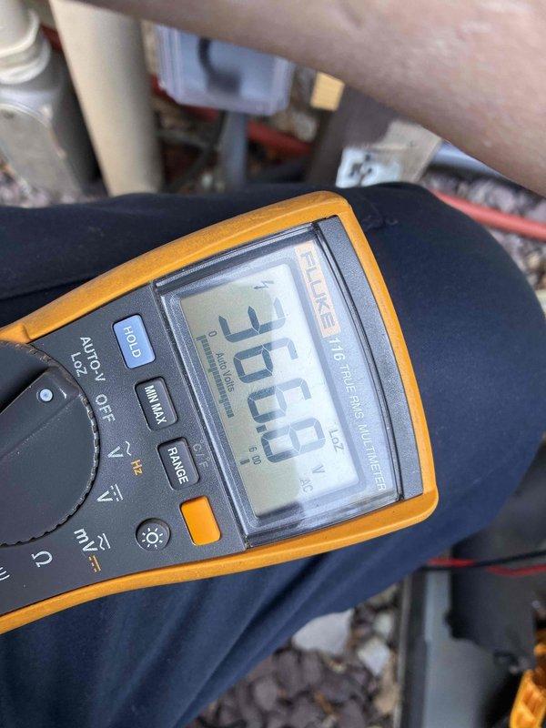 Completed comprehensive cooling system maintenance inspection and diagnostic testing. Performed electrical measurements using digital multimeter, recording voltage reading of 360V, and utilized clamp meter to verify amperage draws on system components. Customer confirmed renewal of maintenance plan for continued service coverage.