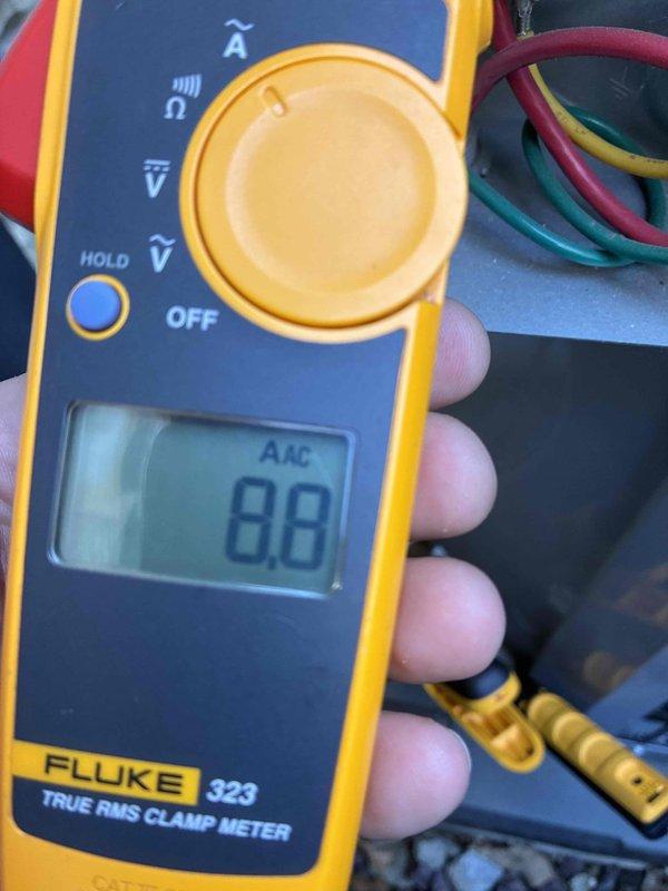 Completed comprehensive cooling system maintenance inspection and diagnostic testing. Performed electrical measurements using digital multimeter, recording voltage reading of 360V, and utilized clamp meter to verify amperage draws on system components. Customer confirmed renewal of maintenance plan for continued service coverage.