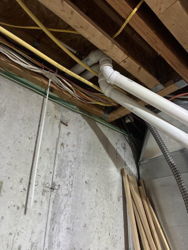 Completed full HVAC system replacement including installation of Carrier Performance Series two-stage air conditioner (26TPA860W003), Carrier Infinity Series two-stage gas furnace (59TN7A120C24--22), evaporator coil (CVAVA6024XMA), and smart thermostat with voice control (EB-STATE6ICR-01). Removed existing equipment and two water heaters from basement area using electric dolly cart, installed new ductwork with PVC drainage piping and electrical wiring through floor joists, and mounted new thermostat on interior wall. System tested and operational with all warranty registrations provided to property owner.