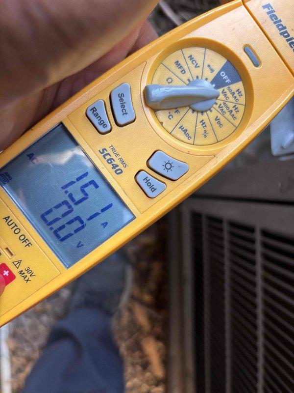 Completed cooling and heating maintenance service on residential HVAC system. Performed comprehensive system inspection including electrical diagnostics with multimeter readings showing 15.1 mV on components, verified proper operation of air handler unit, inspected flexible ductwork connections and electrical wiring integrity, and confirmed all mechanical components functioning within normal parameters.