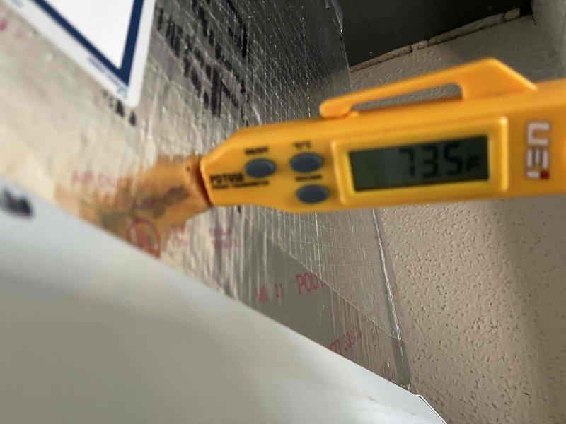 Completed scheduled preventive cooling maintenance on HVAC system. Performed electrical diagnostics using clamp meter to verify proper amperage draw and system performance. Measured supply air temperature at evaporator coil, recording 12.5°F temperature differential indicating adequate cooling capacity and proper refrigerant charge. Inspected evaporator coil condition, noting moisture present from normal condensation during operation, confirming active cooling cycle and proper drainage function.
