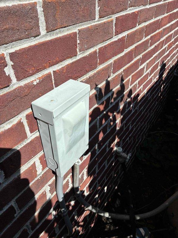 Completed comprehensive cooling and heating maintenance service on residential HVAC system. Inspected exterior condensing unit with protective cage enclosure and electrical junction box, verified proper operation and connections. Evaluated interior thermostat displaying 86°F setpoint with 83.7°F ambient temperature reading, confirmed proper calibration and functionality of digital control system.