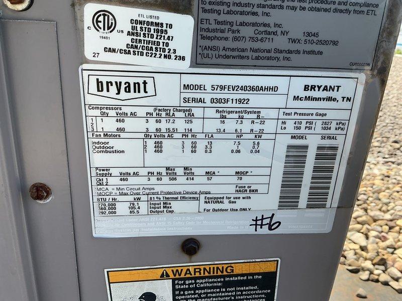 Completed comprehensive tune-up maintenance on Bryant commercial rooftop unit model 579FEV240360AHHD (serial #0303F11922) per checklist requirements. Performed full system inspection, documented all equipment data plate information with photographs as requested, and verified unit operational status. Unit found in satisfactory working condition with filter/coil assembly showing normal environmental accumulation for rooftop installation.