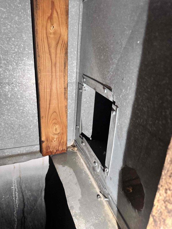 Completed warranty installation of a 3-inch return air scoop for the upstairs HVAC system. The scoop was properly mounted to the existing ductwork and secured to the wooden framing members in the attic space. All connections were verified for proper airflow and the installation was completed per manufacturer specifications.