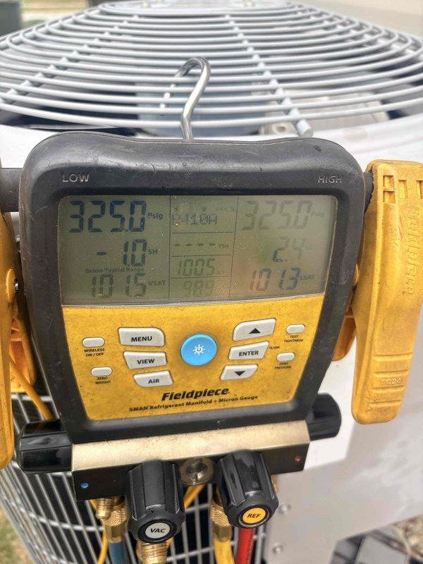 Completed thermostatic expansion valve replacement on residential HVAC system. Recovered existing refrigerant, replaced failed TXV, installed new liquid line filter drier, evacuated system to proper micron level, and recharged with 6 lbs. of R-410A refrigerant. System tested and verified operational with proper superheat and subcooling readings.