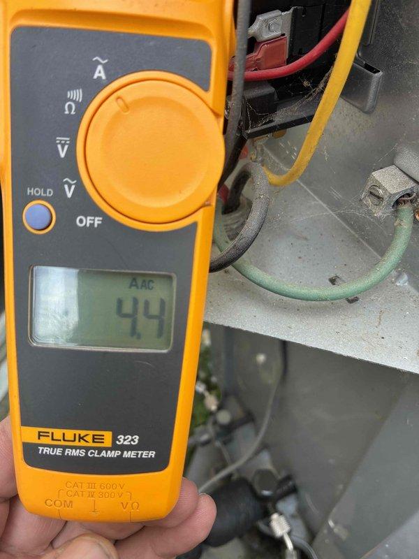 Completed cooling tune-up on residential HVAC system, performing comprehensive inspection of evaporator coil assembly and condenser unit. Verified electrical amperage draw at 44 AAC using clamp meter, confirming system operating within manufacturer specifications. Inspected refrigerant lines, serpentine coil configuration, and all mechanical components with no deficiencies noted.