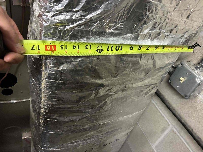 Conducted on-site assessment at Metro Auto Recyclers facility for complete HVAC system replacement estimate. Evaluated existing ductwork infrastructure, measuring insulated supply ducts and inspecting mechanical components in utility areas to determine specifications for new equipment installation.
