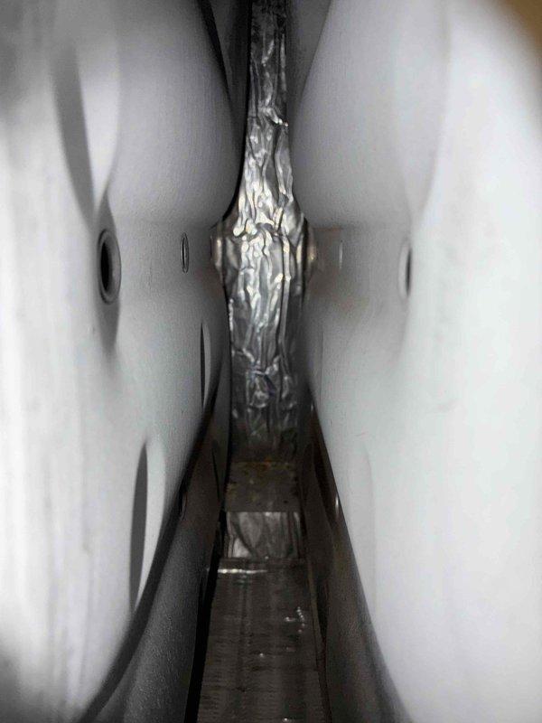 Conducted comprehensive site assessment for complete HVAC system replacement, taking detailed measurements of existing equipment and ductwork clearances in confined mechanical space. Documented current system configuration including refrigerant line routing and equipment dimensions to prepare accurate replacement quote for Duke Energy referral program.
