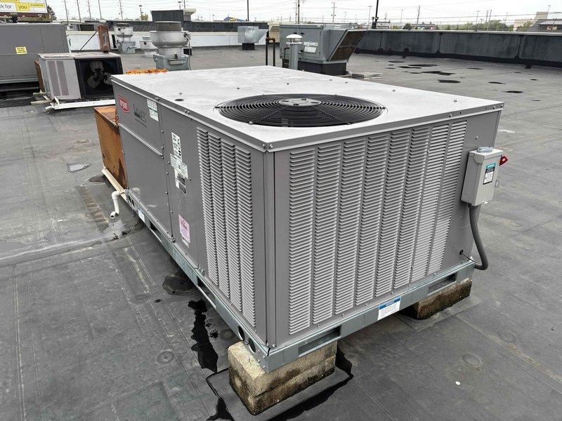 Conducted site survey of commercial rooftop HVAC equipment to document system specifications and conditions for maintenance plan proposal. Photographed multiple packaged rooftop units, recorded equipment data from manufacturer labels, and verified thermostat operation and settings inside facility.
