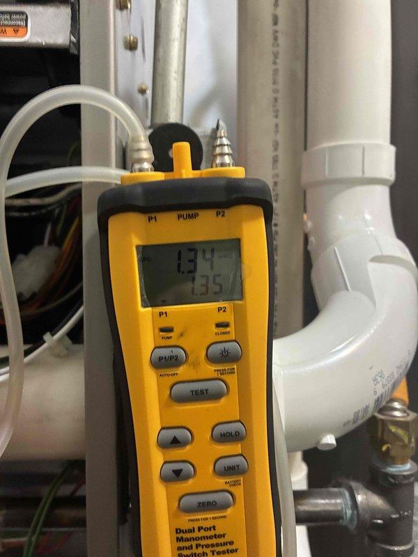 Completed comprehensive preventive maintenance on a three-year-old furnace system located in basement with no reported operational issues. Performed full system diagnostics including voltage measurements using digital multimeter, pressure testing with dual-port manometer, and inspection of all major components. All readings confirmed system operating within manufacturer specifications; verified proper gas pressure, electrical connections, and condensate drainage system functionality.