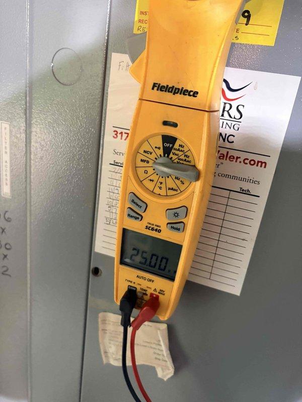 Completed scheduled heating maintenance on residential HVAC system. Performed comprehensive inspection of furnace control board and electrical components, verifying proper operation of all relays, circuits, and connections. Utilized multimeter to test voltage readings across control panel, confirming system operating within manufacturer specifications at 250mV on tested circuit. Inspected all wire terminations, including power and control wiring with proper color coding intact. Verified capacitor condition and all safety controls functioning correctly. System tested and left in proper operating condition for the heating season.