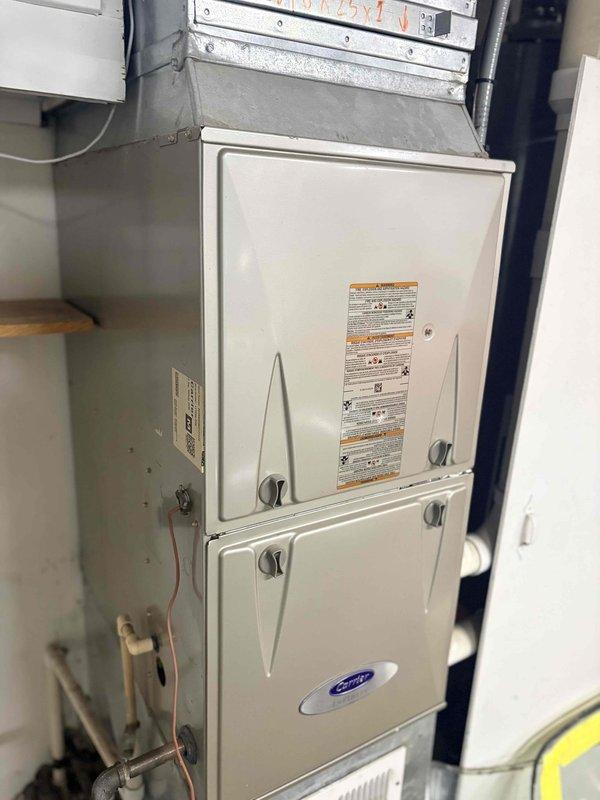 Completed first cooling maintenance service on residential HVAC system with Carrier furnace and Honeywell programmable thermostat. Performed comprehensive system inspection, verified thermostat operation and temperature differential, inspected furnace cabinet and ductwork connections, and documented equipment condition with all components operating within normal parameters.