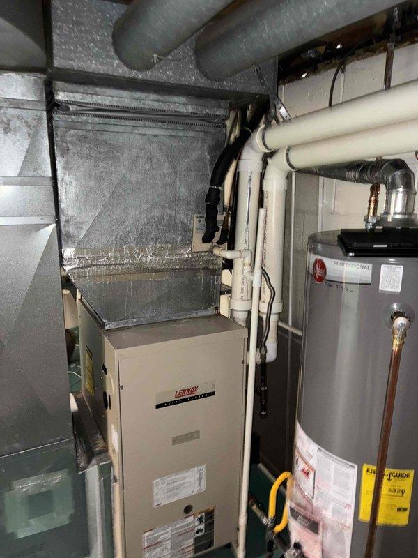 Conducted on-site assessment of existing Lennox furnace and HVAC system to provide replacement estimate for both air conditioning and heating equipment. Evaluated current mechanical room configuration, measured clearances between components, and documented existing ductwork layout including supply register positioning. Reviewed customer request for additional thermostat installation on upper level and assessed feasibility of relocating mid-room air supply register to perimeter location near window for improved airflow distribution and aesthetics.
