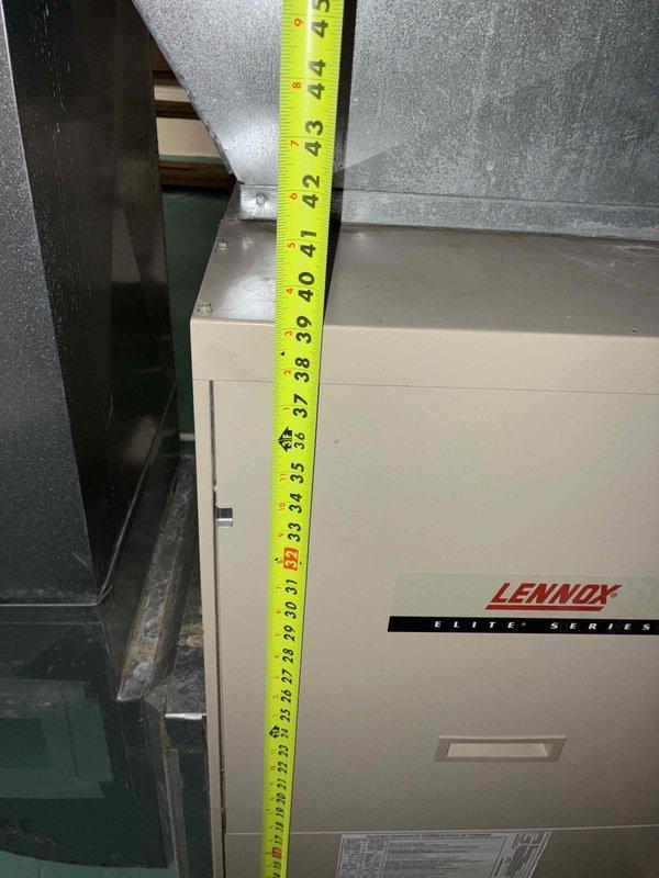 Conducted on-site assessment of existing Lennox furnace and HVAC system to provide replacement estimate for both air conditioning and heating equipment. Evaluated current mechanical room configuration, measured clearances between components, and documented existing ductwork layout including supply register positioning. Reviewed customer request for additional thermostat installation on upper level and assessed feasibility of relocating mid-room air supply register to perimeter location near window for improved airflow distribution and aesthetics.