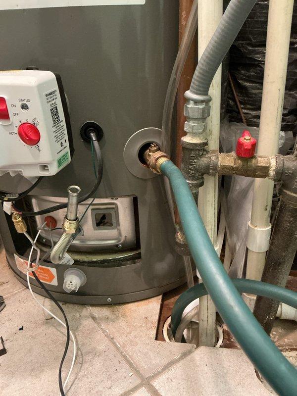 Performed warranty replacement of gas control valve on residential water heater. Shut off water supply and drained tank and supply piping completely. Removed defective gas valve and installed new warranty replacement unit. Restored water supply to heater, filled tank, and systematically purged all air from supply lines throughout the home. Tested unit operation through complete heating cycle to verify proper function of new gas valve assembly. All connections secured and system returned to normal operation.