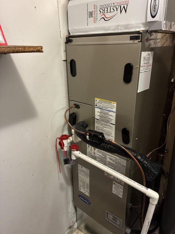 Completed full heat pump system installation consisting of Carrier Comfort Series 27SCA530A003 single-stage heat pump condenser, FJ5ANXB30L00 single-stage air handler, and TSTATCCEWF-01 Wi-Fi smart thermostat. Installed and mounted air handler in utility space, ran refrigerant lines and condensate drainage with PVC piping, made all electrical connections, and completed system startup with operational testing. Configured smart thermostat with Wi-Fi connectivity and verified proper heating and cooling operation across all system components.