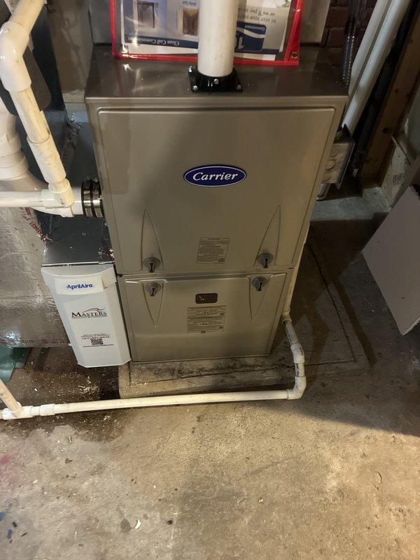Successfully installed a Carrier 59SC6A080M17--16 Comfort Series single-stage gas furnace in the basement mechanical room with all necessary venting and connections completed. Mounted and configured a Carrier TSTATCCEWF-01 Wi-Fi smart thermostat, establishing wireless connectivity and programming for optimal system operation. The existing Aprilaire humidifier was integrated with the new furnace installation, and all systems were tested and verified operational with proper airflow and temperature control.